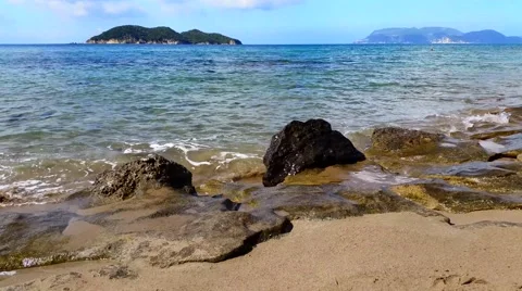 Waves hitting rocks - Rocky beach Stock Footage 41251616