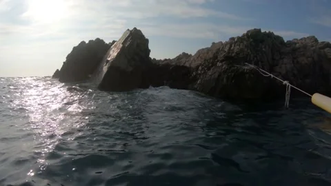 Waves hitting rocks at sea Stock Footage 160624691