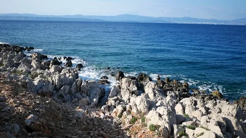 Waves hitting the rocks on seaside Stock Footage 112759424
