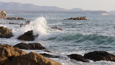 Waves hitting rocky beach. Stock Footage 123814955