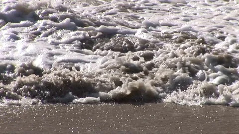 Waves hitting sand 1 Stock Footage 92875029