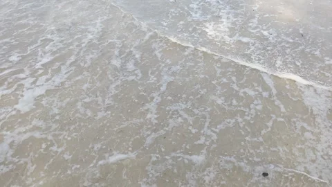 Waves hitting seashore come and go. 스톡 동영상 293081235