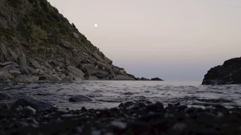 Waves Hitting the Shore at Dusk Video stock 79660492