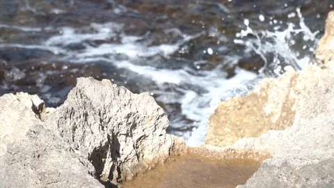 Waves hitting the shore Stock Footage 127869089