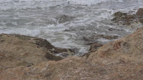 Waves hitting the shore Stock Footage 127871191