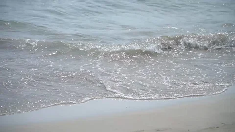 Waves hitting the shore Stock Footage 128351957