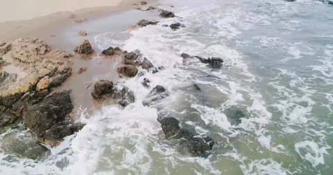 Waves hitting the shore Stock Footage 296603705