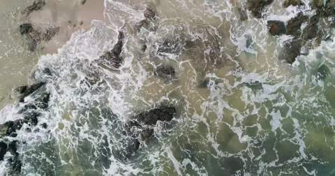 Waves hitting the shore Stock Footage 296603706