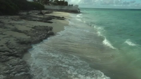 Waves Hitting Shore with Seaweed 스톡 동영상 58846087
