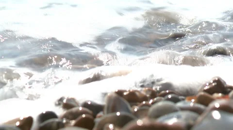 Waves hitting the shores Stock Footage 32963438