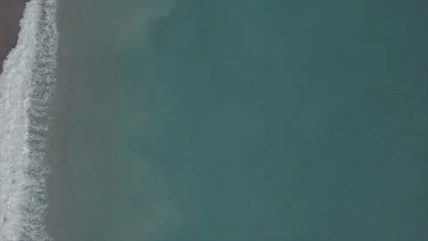 Waves hitting the shore.(vertical video) Stock Footage 150107577