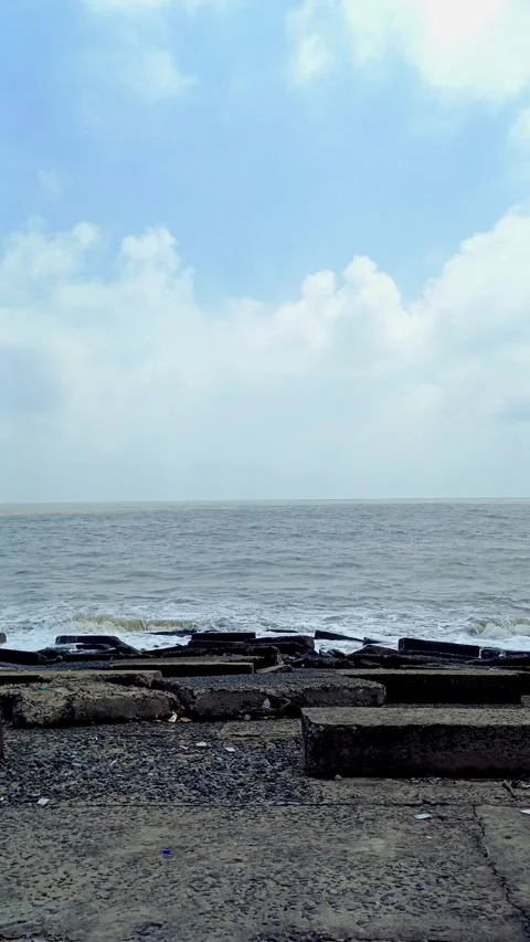 Waves hitting stone blocks in Digha Stock Footage 272231501
