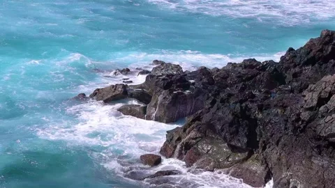 Waves hitting volcanic rocks, Lanzarote, Canary Islands. Slow motion, HD Stock Footage 168346457