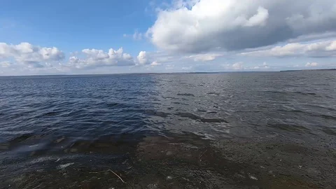 Waves with ice on the reservoir. Dam. Video stock 104590273