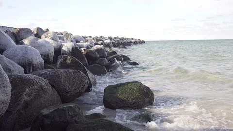 Waves on Icy Shoreline Stock Footage 86517454