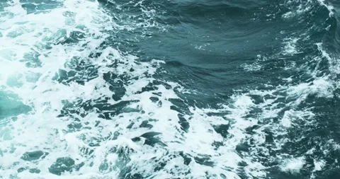 Waves of the Indian Ocean, white foam of sea water diverging at the bottom of th Stock Footage 134193309
