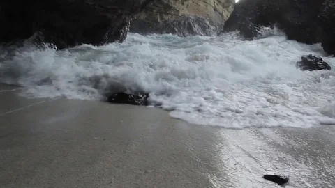 Waves inside an Indonesian Cave Stock Footage 77558744
