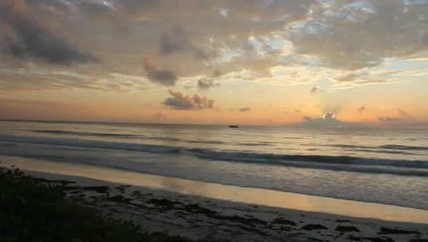 Waves on Kenya Coast with Spectacular Clouds and a Colorful Sunrise  (HD) Stock Footage 9864604