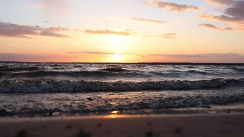 Waves on the lake during sunset. Peace and tranquility. Travel concept. Stock Footage 152944431