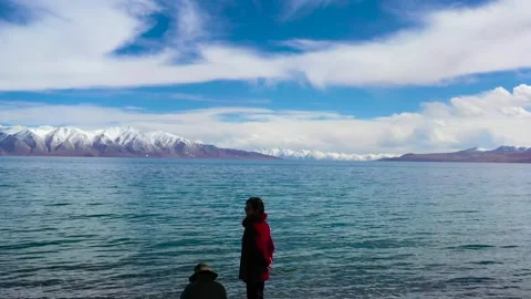 Waves, lake waves, river waves, waves, distant snow mountains Stock Footage 243071506