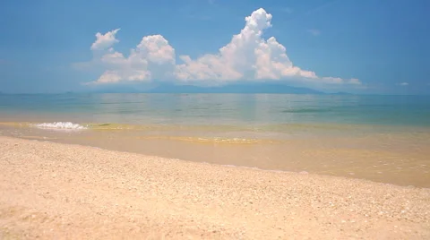 Waves landing on sandy beach Stock Footage 2573181