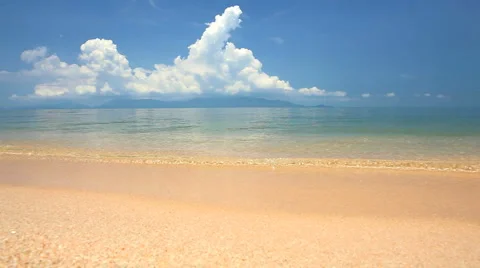Waves landing on sandy beach Stock Footage 2659009