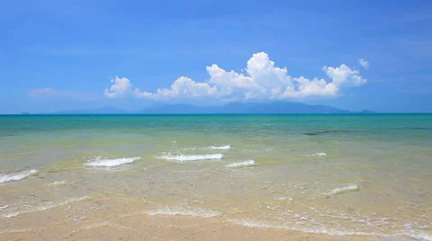 Waves landing on sandy beach Stock Footage 3338196