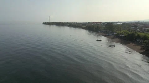 Waves Lap Calmly On Buleleng Beach At Sunrise North Bali Indonesia Drone Track 스톡 동영상 344961864