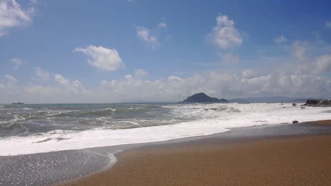 Waves Lapping Against the Mountains Stock-Footage 327611571
