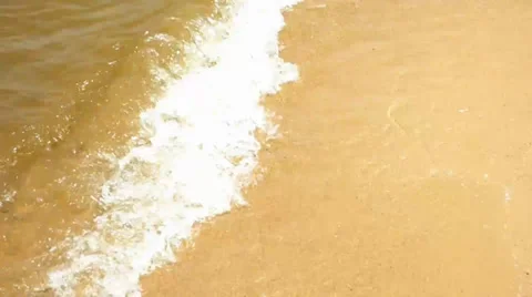 Waves Lapping Ashore the Beach Video stock 38492589