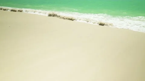 Waves lapping on the beach, Clear sand on tropical beach in summer season Stock Footage 153505991