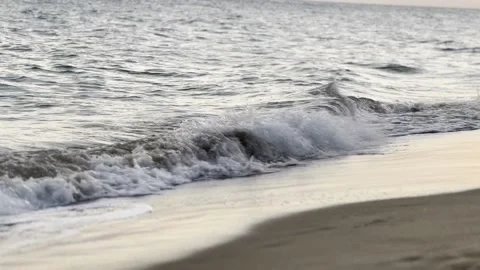 Waves lapping at the beach Stock Footage 232317921