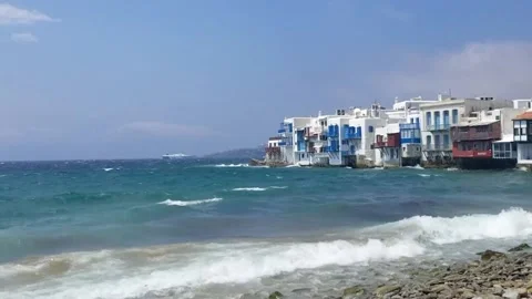 Waves lapping on the beach at Little Venice, Mykonos, Greece Video stock 133423928