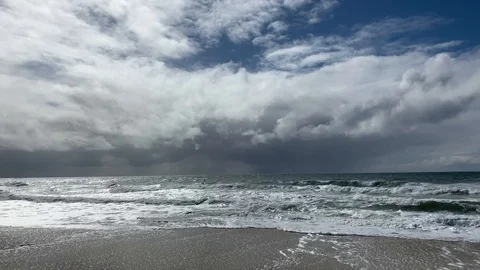 Waves Lapping the Beach on a Stormy Day Stock Footage 102572217
