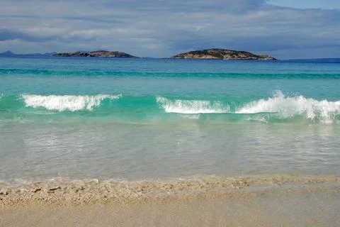 Waves lapping the beautiful white sand beach at lucky bay cape le grand nat.. 写真素材