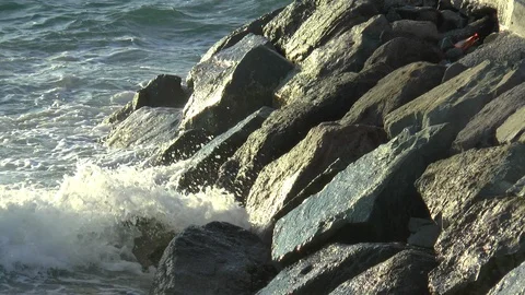 Waves Lapping on A breakwater Stock Footage 120461289