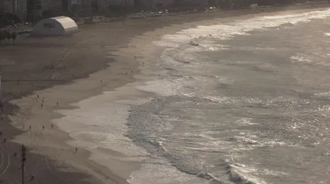 Waves Lapping on Copacabana Beach at Sunrise in Rio Stock Footage 64978625