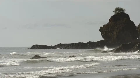 Waves lapping the rocks Stock Footage 126791222