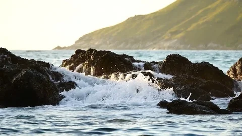 The waves lapping rocks  in the sea in the summer season at Andaman Sea or Pa Stock Footage 81345387