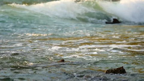 The waves lapping rocks  in the sea in the summer season at Andaman Sea or Pa Stock Footage 81345528