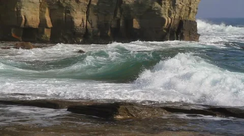 Waves lapping on the rocky coast Video stock 57638959