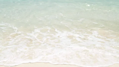 Waves Lapping on the Sandy Beach Stock Footage 327586655