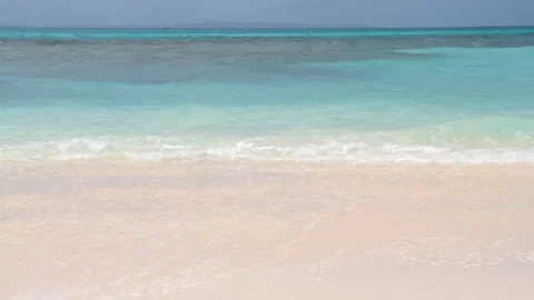 Waves Lapping on the Sandy Beach 스톡 동영상 327587086