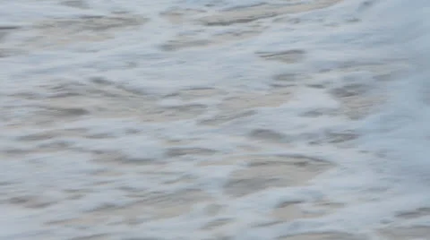 Waves lapping on the shore Video stock 23017097