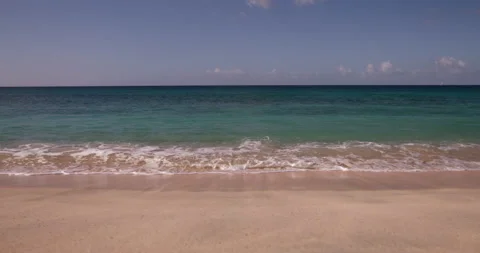 Waves lapping the shore on Magazine Beach, Grenada, West Indies, Caribbean, Stock Footage 138646843