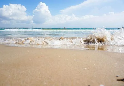 Waves lapping on the shore Stock Photos