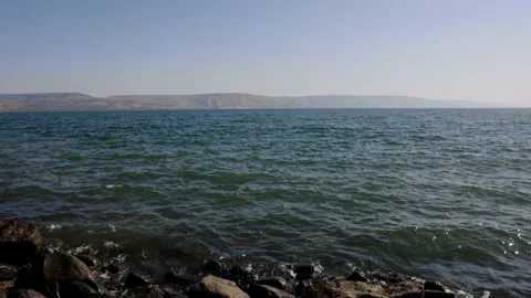 Waves lapping on the Short at the Sea of Galilee in Israel Stock Footage 226406103