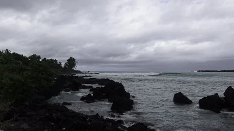 Waves on the lava rocks with ocean sounds Video stock 81683548