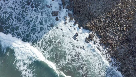 Waves on low tide on the rocks drone aerial view, Basque Country Stock Footage 122031965