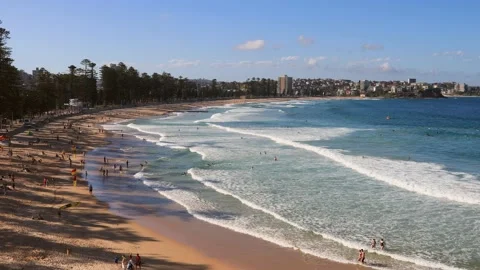 Waves on Manly beach in Sydney on summer day water sport family life 4k. Stock Footage 143139528